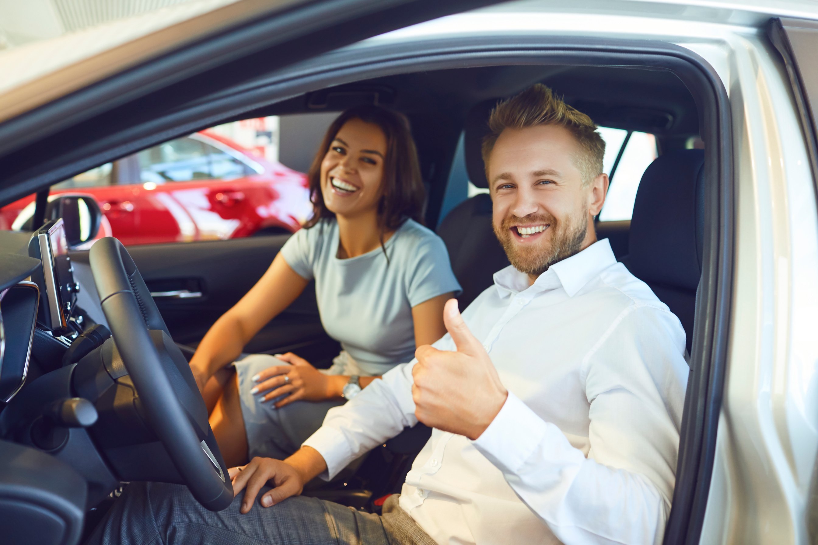 Happy Couple Buying a Car